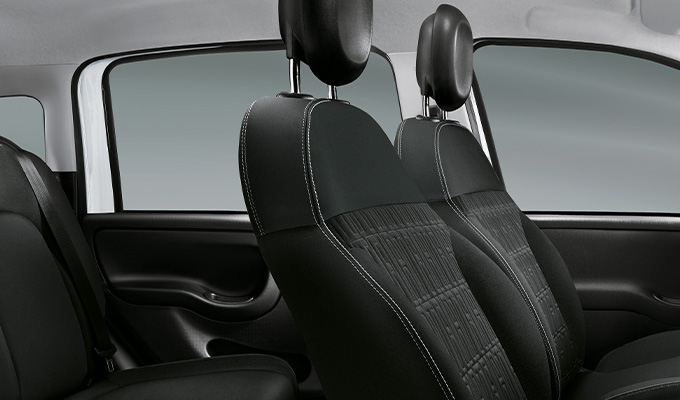 Panda_Exterior-Interior_sustainable-comfort-black-seats-desktop-680×400